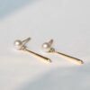 Stud Earrings with 6mm Cultured Akoya pearls in 14Kt Gold Diamonds