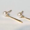 Stud Earrings with 6mm Cultured Akoya pearls in 14Kt Gold Diamonds