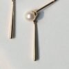 Stud Earrings with 6mm Cultured Akoya pearls in 14Kt Gold Diamonds