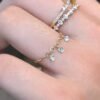 il_fullxfull.3932133714_h29n-1 18K Drilled Diamond Cluster Ring