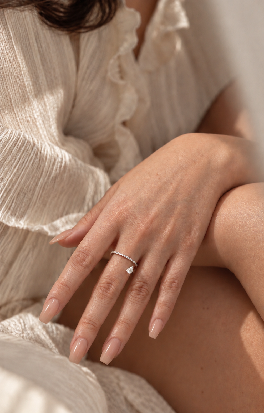 682f0ac0-3e1b-486c-b842-0b218206de5d-2 18K Gold Floating Pear Diamond Open Ring