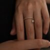 img_0867-2 18K Gold Floating Pear Diamond Open Ring