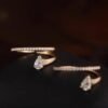 img_0870-2 18K Gold Floating Pear Diamond Open Ring